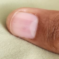 Largo Nails - She didn't brush the lint off my nails and as you can see in this photo she painted the clear gel over it. TERRIBLE!!!!