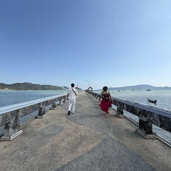 Raquels Unique Travel - Walking the pier in Thailand - Travel Agents Near Me Raquels Unique Travel - Walking the pier in Thailand - Travel Agents Near Me