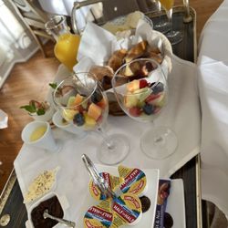 Palmetto Riverside Bed and Breakfast - Breakfast tray - butter, apple jam, ginger & vanilla custard, baked breads, fruit, yogurt w/ maple syrup, mango pineapple banana smoothie