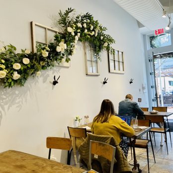 maman - a woman sitting at a table in a cafe - Bakeries Near Me - Brooklyn, New York maman - a woman sitting at a table in a cafe - Bakeries Near Me - Brooklyn, New York