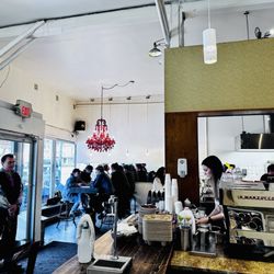 Greenhorn Cafe - Interior of greenhorn with eye catching red chandelier