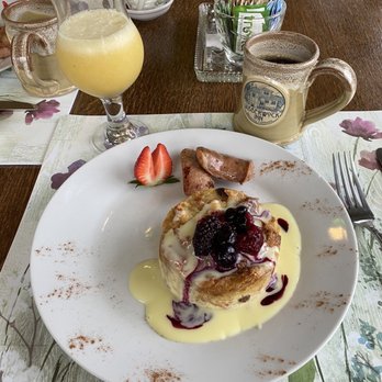 The Jabberwock Inn - Croissant bread pudding with a berry compost and vanilla sauce. Breakfast chicken sausage. Coffee and the amazing house made Jabberjuice. - Bed & Breakfast Near Me - Monterey, California The Jabberwock Inn - Croissant bread pudding with a berry compost and vanilla sauce. Breakfast chicken sausage. Coffee and the amazing house made Jabberjuice. - Bed & Breakfast Near Me - Monterey, California