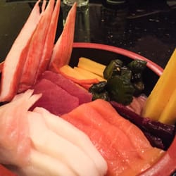 Nikko Japanese Steak and Seafood - Chirashi: Salmon, Tuna, White Tuna, Red Snapper?, Tamago, Imitation Crab, and Japanese Pickles over sushi rice.