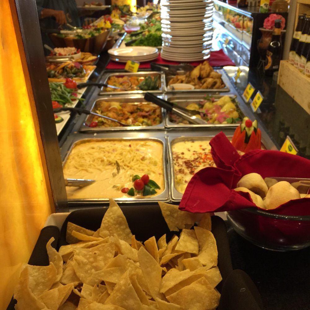 Mr. Pampas - One end of the salad bar with views of the hot meat dishes. - Brazilian Near Me - Ensenada, BCN