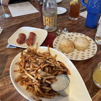 Ralph's on the Park - Truffle fries, buttermilk biscuits and creole countey jalepeno summer sausage - Cajun/Creole Near Me - New Orleans, Louisiana