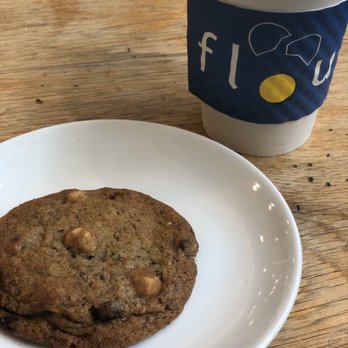 Flour Bakery + Cafe - Chocolate hazelnut cookie and cappuccino - Coffee & Tea Near Me - Cambridge, Massachusetts Flour Bakery + Cafe - Chocolate hazelnut cookie and cappuccino - Coffee & Tea Near Me - Cambridge, Massachusetts