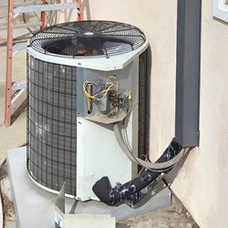 World Appliances - The outside AC John re-assembled for me and got working.