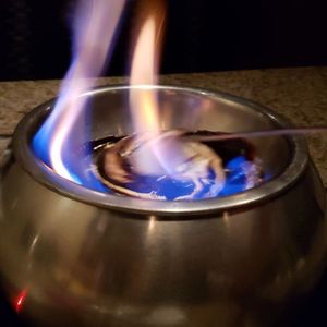Photo of The Melting Pot - Duluth, GA, United States. Rocky road without candied pecans. Dark chocolate and marshmallow being toasted with a bit of liqueur. Flambeau