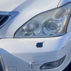 Tommy's Auto Repair - Damage on front bumper