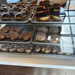 The display of some of their awesome donuts The display of some of their awesome donuts