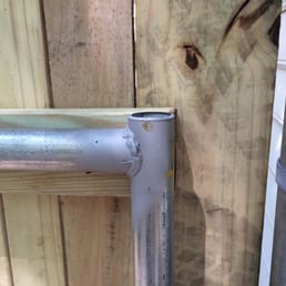 2x4 cut too short on both sides of metal gate leaving only the edge of the picket to weakly attach it to the gate. Easily broken off. 2x4 cut too short on both sides of metal gate leaving only the edge of the picket to weakly attach it to the gate. Easily broken off.