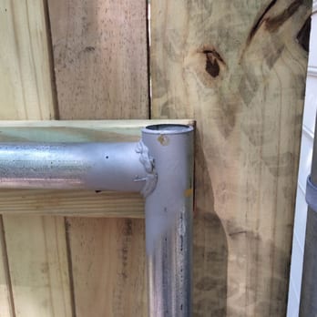 Rosenbaum Fence Company - 2x4 cut too short on both sides of metal gate leaving only the edge of the picket to weakly attach it to the gate. Easily broken off. - Fences & Gates Near Me - Hampton, Virginia Rosenbaum Fence Company - 2x4 cut too short on both sides of metal gate leaving only the edge of the picket to weakly attach it to the gate. Easily broken off. - Fences & Gates Near Me - Hampton, Virginia