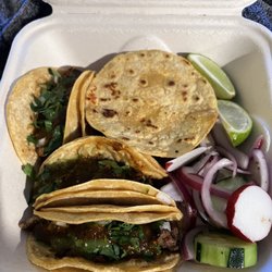 Tacos La Cascada - 2 Asada tacos, an al pastor taco and a mulita.