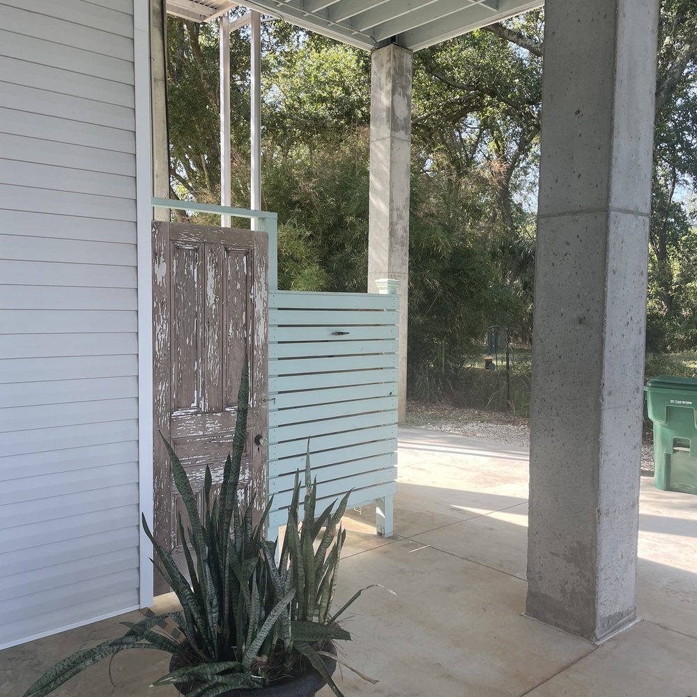 JCG Construction - Outdoor bathroom with old antique door. - General Contractors Near Me JCG Construction - Outdoor bathroom with old antique door. - General Contractors Near Me