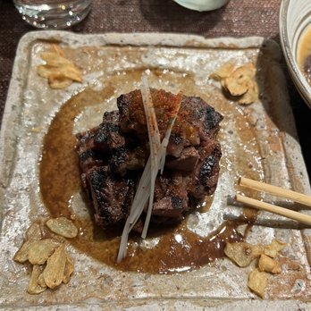 Zuma - Rib Eye Steak rib eye steak with wafu sauce and garlic chips* - Sushi Bars Near Me - New York, New York
