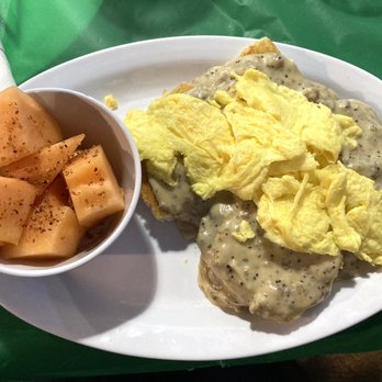 The OV Beach Tavern - Brunch Biscuits and Gravy. This dish is served with your choice of tater tots or spiced melon (topped with Tajin). - Sports Bars Near Me - Norfolk, Virginia The OV Beach Tavern - Brunch Biscuits and Gravy. This dish is served with your choice of tater tots or spiced melon (topped with Tajin). - Sports Bars Near Me - Norfolk, Virginia
