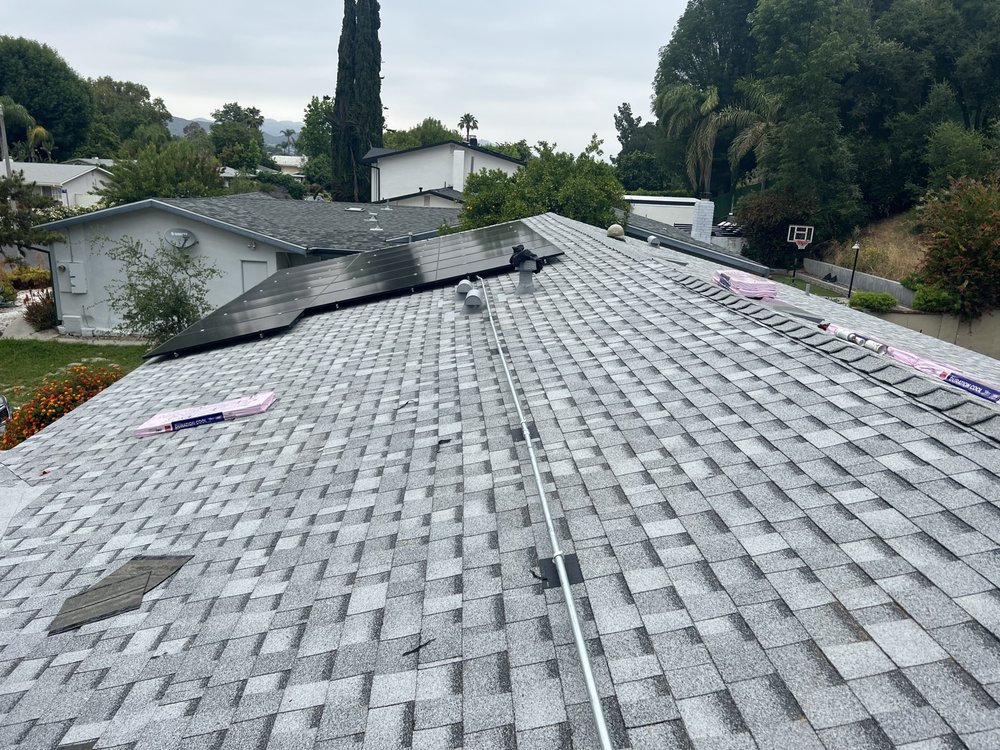 Slide of Twins Roofing