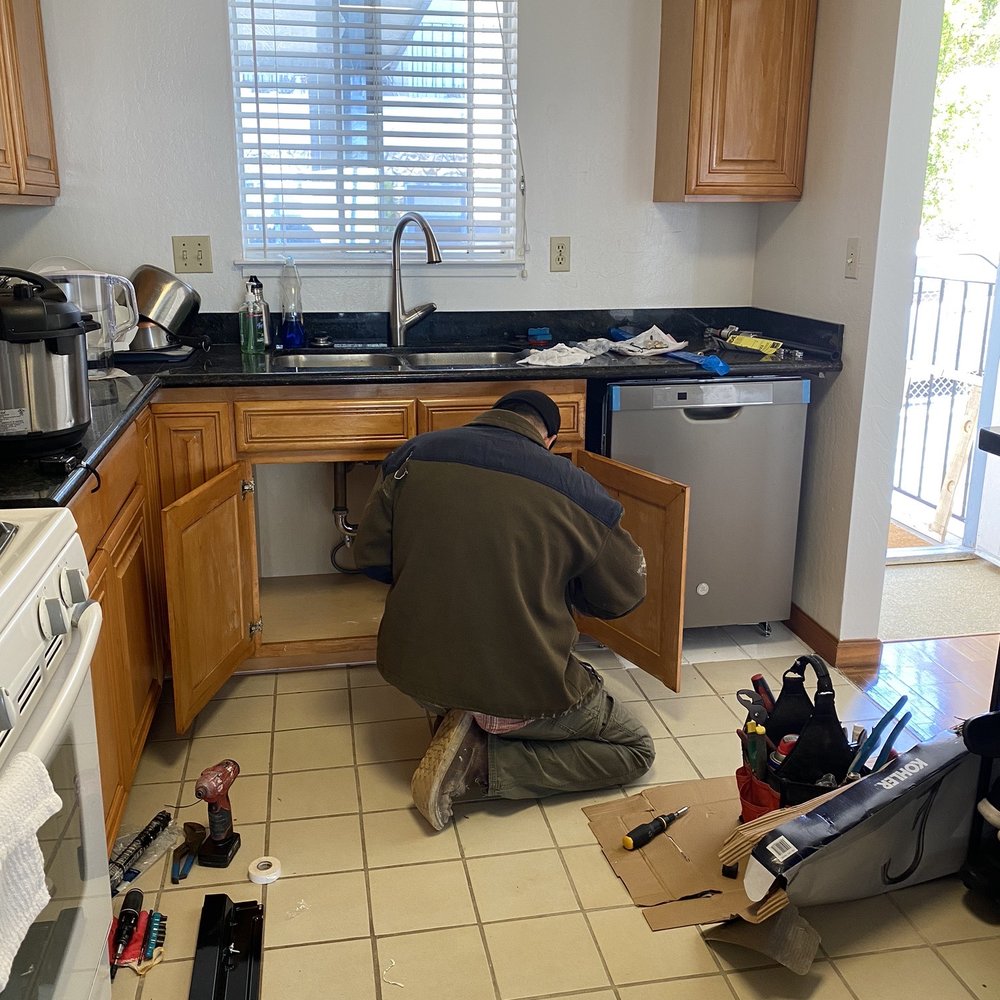 Anariba Builders - Victor working on hooking up the dishwasher - Siding Near Me - Daly City, California Anariba Builders - Victor working on hooking up the dishwasher - Siding Near Me - Daly City, California