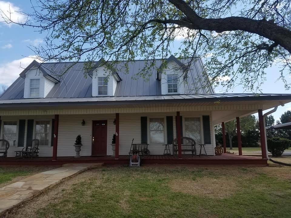 Slide of Guaranteed Roofing & Construction