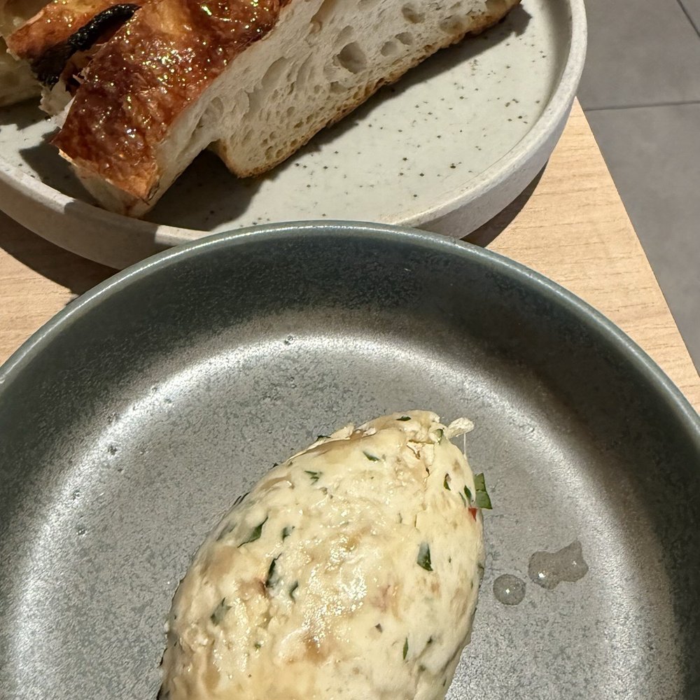 Lucia - Sourdough Focaccia + Seasonal Butter - Italian Near Me - Vancouver, British Columbia Lucia - Sourdough Focaccia + Seasonal Butter - Italian Near Me - Vancouver, British Columbia