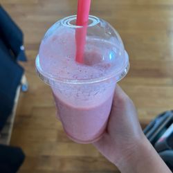 Banana smoothie with strawberry flavored syrup