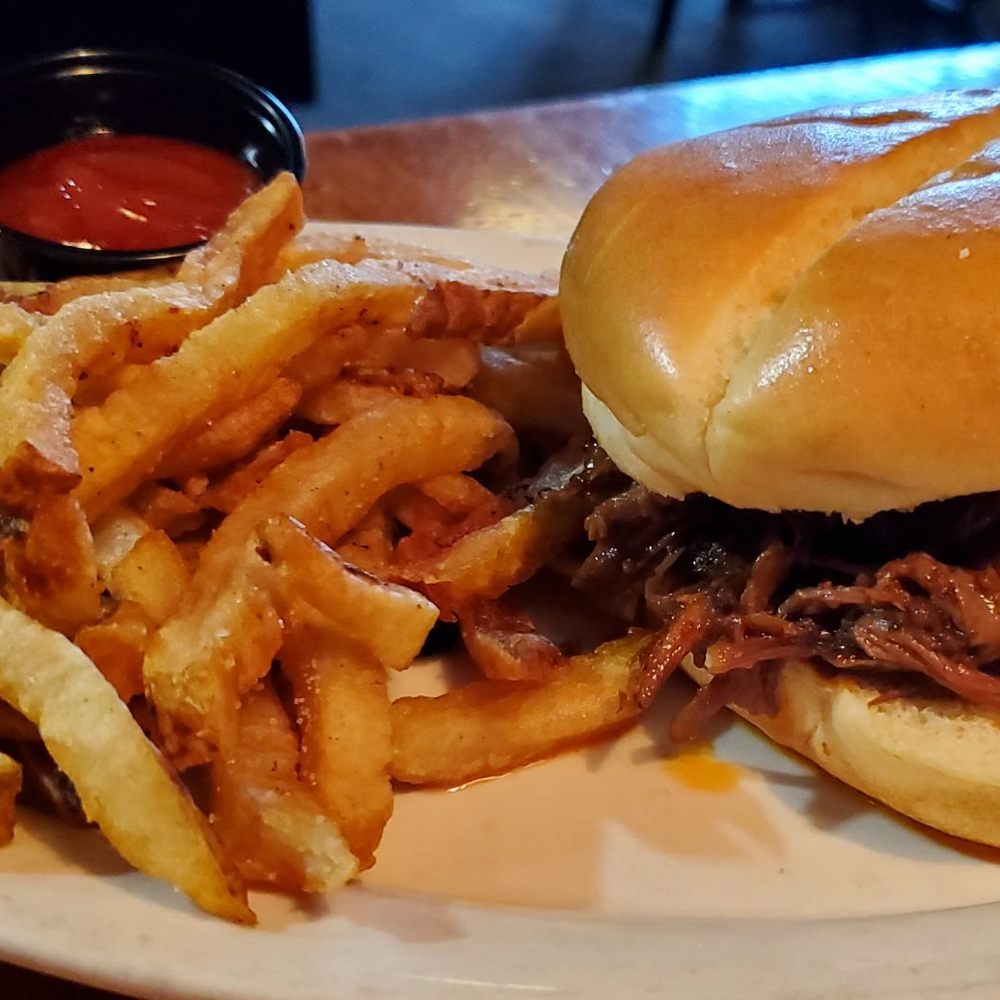 Evolution Craft Brewing Co. & Public House - Brisket sandwich with fries - New American Near Me - Salisbury, Maryland