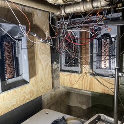 Quality Residential Electrical - Riverside IL. Mid project, since the building was fully occupied, we had to temporarily install power for the evening.