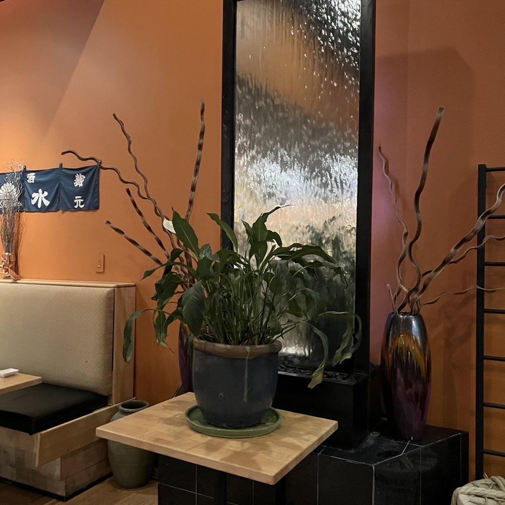 Zushi Bistro - a living room with orange walls - Sushi Bars Near Me - Virginia Beach, Virginia Zushi Bistro - a living room with orange walls - Sushi Bars Near Me - Virginia Beach, Virginia