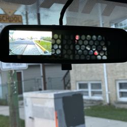 Van has reverse monitor from the backend camera in the mirror!