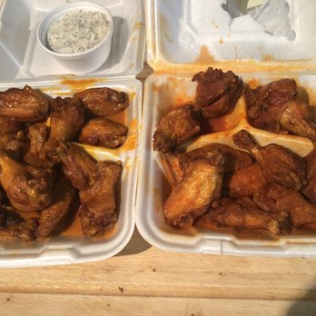 Wings Plus - 25 wings well done. KW on left and Buffalo Hot on right - Chicken Wings Near Me - Fort Lauderdale, Florida