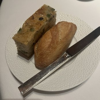 Le Bernardin - Bread service: Olive Foccacia and Baguette - French Near Me - New York, New York Le Bernardin - Bread service: Olive Foccacia and Baguette - French Near Me - New York, New York