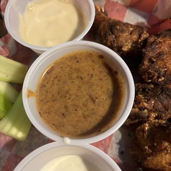 Twisted Fisherman - Banana Cajun wing sauce - Seafood Near Me - Milwaukee, Wisconsin Twisted Fisherman - Banana Cajun wing sauce - Seafood Near Me - Milwaukee, Wisconsin