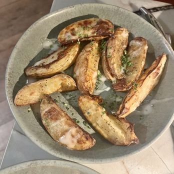 Peregrine - Salt roasted potatoes with olive oil - American Near Me - Raleigh, North Carolina Peregrine - Salt roasted potatoes with olive oil - American Near Me - Raleigh, North Carolina