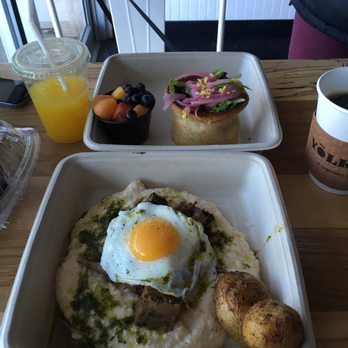 Yolklore - The special which consisted of Coffee Braised Beef, fried egg over cheesy grits and The Nest Egg. Looks great but lacking taste. - Breakfast & Brunch Near Me - St. Louis, Missouri Yolklore - The special which consisted of Coffee Braised Beef, fried egg over cheesy grits and The Nest Egg. Looks great but lacking taste. - Breakfast & Brunch Near Me - St. Louis, Missouri