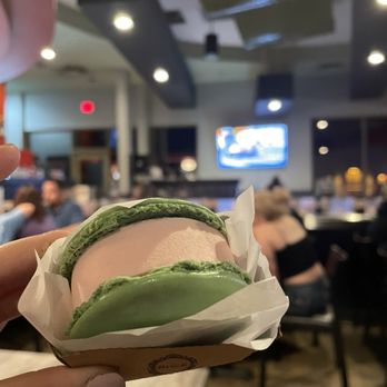 KiKu Revolving Sushi - Macaron strawberry ice cream sandwhich with KPop videos in the background - Sushi Bars Near Me - Glendale, Arizona KiKu Revolving Sushi - Macaron strawberry ice cream sandwhich with KPop videos in the background - Sushi Bars Near Me - Glendale, Arizona