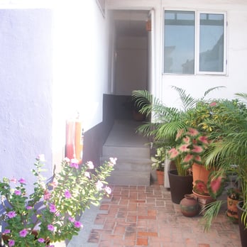 Villa Mercedes - hallway leading to the stairs from the top floor suites. notice all the lush plants everywhere! - Hotels Near Me - Puerto Vallarta, JAL