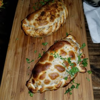 Bunbury - Braised Lamb & Prosciutto Mushroom Brie empanadas. Fresh & piping hot. Yum! - Argentine Near Me - Miami, Florida