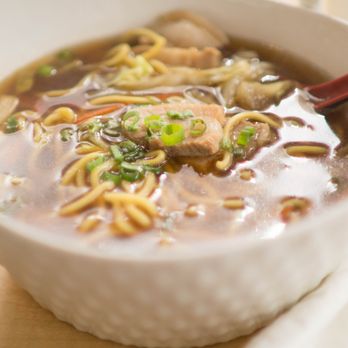 Sushi Ya - a bowl of ramen soup with chopsticks - Japanese Near Me - Eugene, Oregon