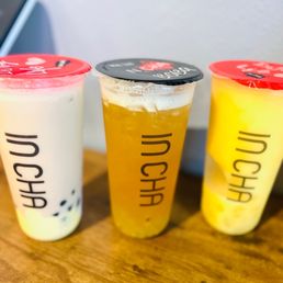 three different drinks on a table three different drinks on a table