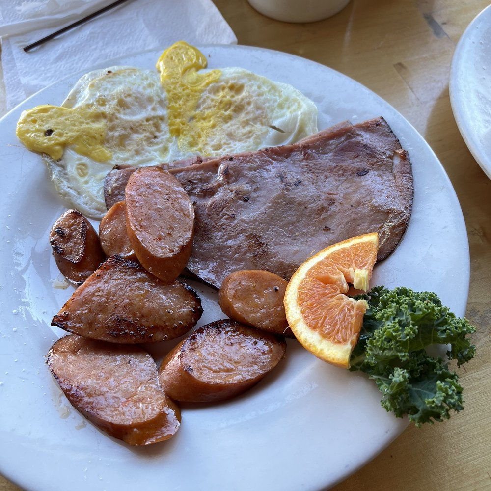 The eggs and ham that comes with the Big Breakfast and I added a side of kielbasa.