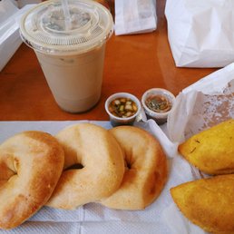 donuts and coffee on a table donuts and coffee on a table