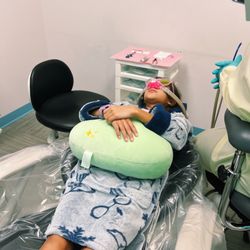 Noe Valley Smiles and Braces - 5th tooth extraction for my 9-year old daughter. Pajamas. Check. Stuffie. Check.