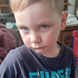 Cost Cutters - Don't mind his crabby face he didn't want his picture taken!