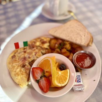 Immigrant Son Caffe - Omelette, potatoes, fruit, and toast - New American Near Me - Ventura, California Immigrant Son Caffe - Omelette, potatoes, fruit, and toast - New American Near Me - Ventura, California