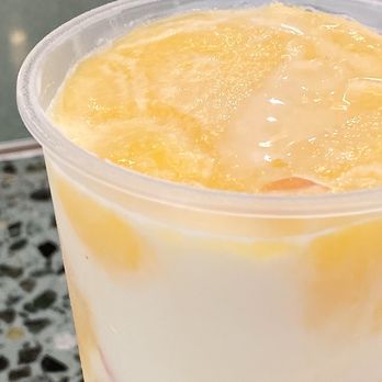 Jam Jam Tea & Moments - Coconut Mango Pomelo ($6.95) with added Mango Bits (extra 25 cents) - Close Up - Bubble Tea Near Me - Walnut, California Jam Jam Tea & Moments - Coconut Mango Pomelo ($6.95) with added Mango Bits (extra 25 cents) - Close Up - Bubble Tea Near Me - Walnut, California