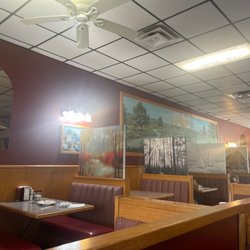 Sunrise Restaurant - Prints on all the booths.