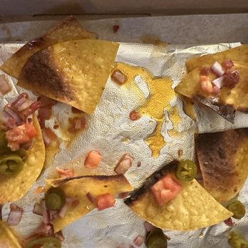 The Bench - Greasy tortilla chips with burnt edges - Pizza Near Me - Stowe, Vermont