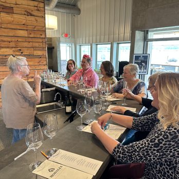 The Bottle Run - Cat giving a guided tasting. - Wine Tours Near Me