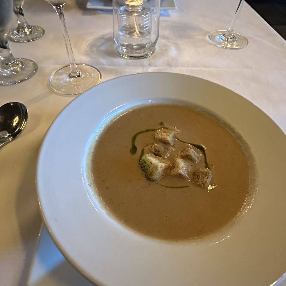 Dolce - Cauliflower Soup with truffle oil drizzle. - New American Near Me - Omaha, Nebraska Dolce - Cauliflower Soup with truffle oil drizzle. - New American Near Me - Omaha, Nebraska