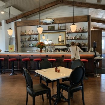 Filberts Farmhouse Kitchen - The bar area by the reception desk - New American Near Me - Aurora, Oregon Filberts Farmhouse Kitchen - The bar area by the reception desk - New American Near Me - Aurora, Oregon